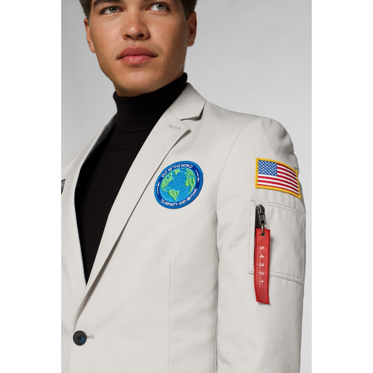 Op deze afbeelding zie je een Kostuums, van het merk Opposuits. Out Of This World Astronaut Jas Man