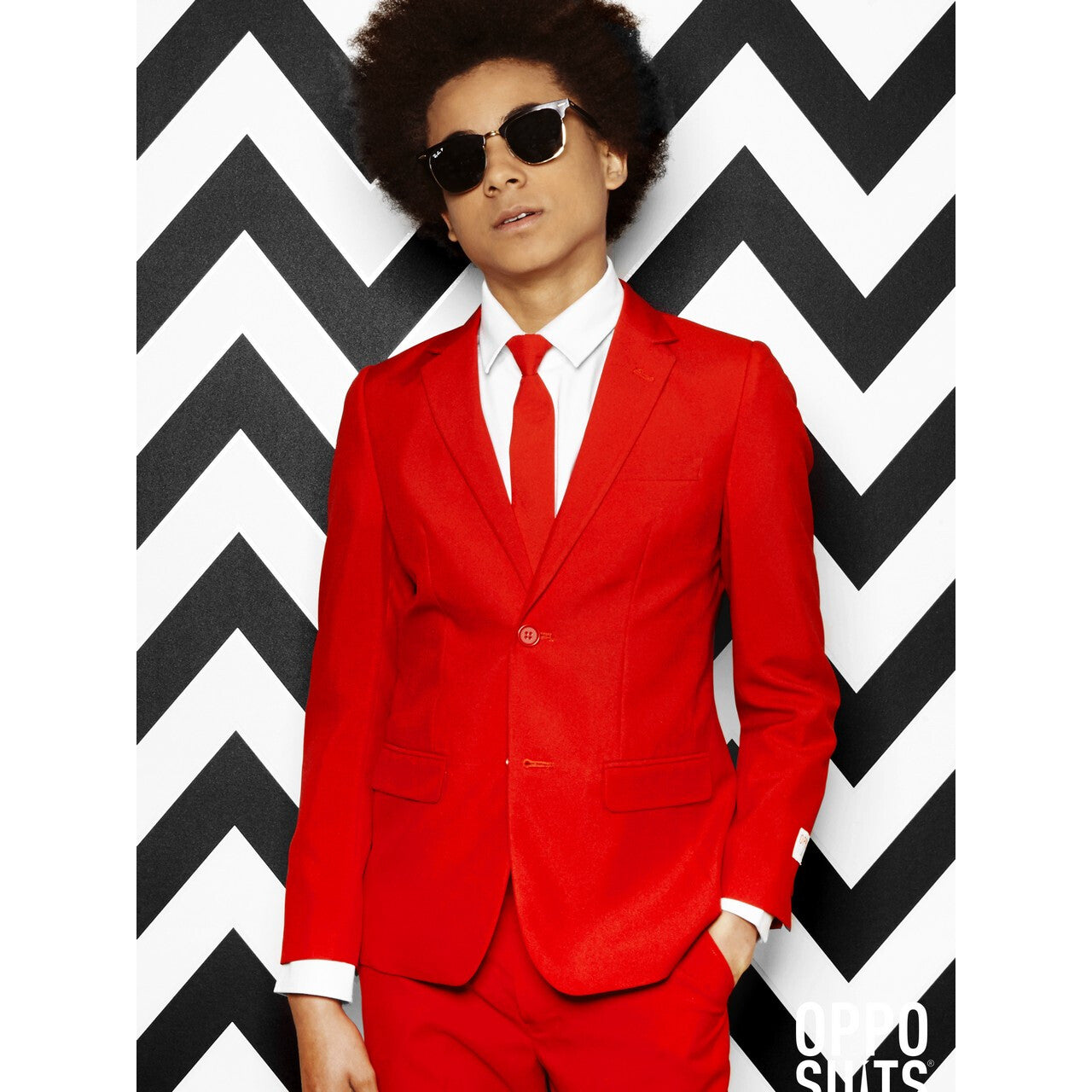 Op deze afbeelding zie je een Kostuums, van het merk Opposuits. Intense Red Devil Opposuit Teen Jongen Kostuum
