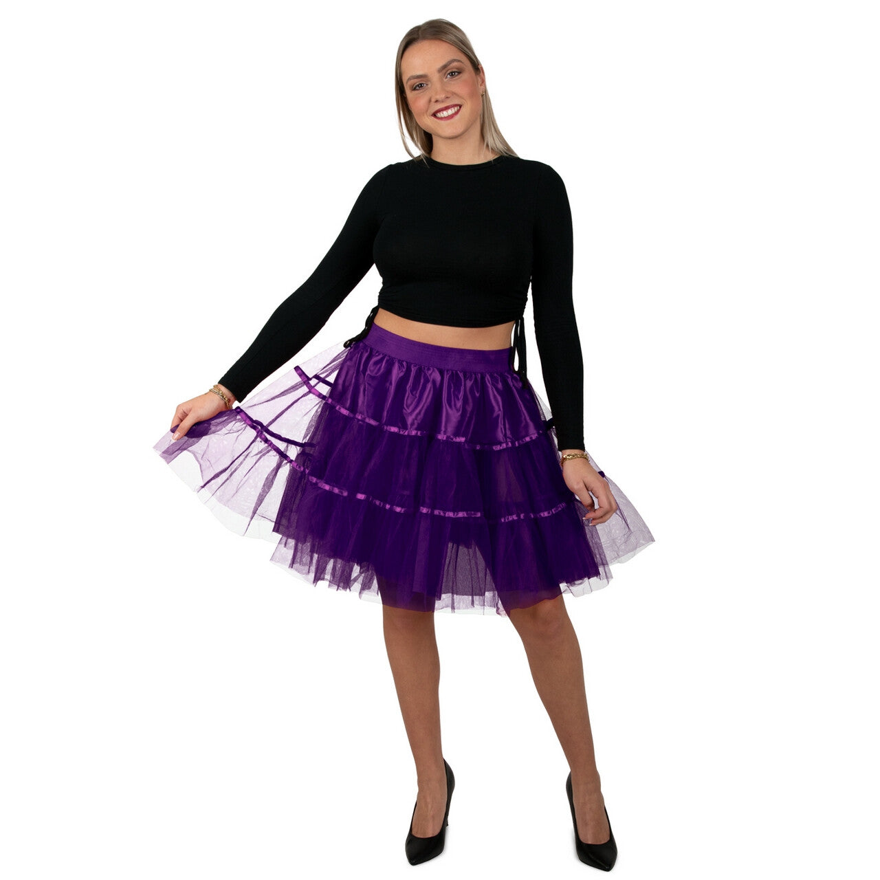Op deze afbeelding zie je een Kostuums, van het merk PartyXplosion. Betoverende Heksachtige Petticoat Paars 65 Centimeter Vrouw