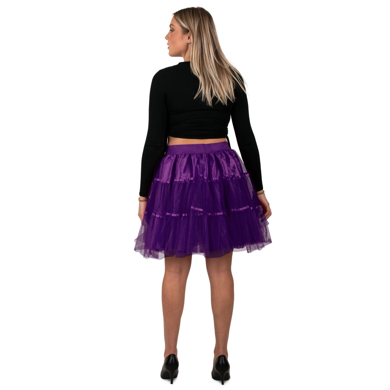 Op deze afbeelding zie je een Kostuums, van het merk PartyXplosion. Betoverende Heksachtige Petticoat Paars 65 Centimeter Vrouw