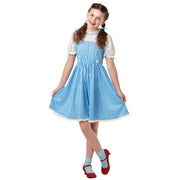 Op deze afbeelding zie je een Kostuums, van het merk Rubies. Dorothy Kostuum Meisje