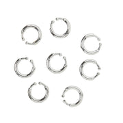 Op deze afbeelding zie je een Accessoires, van het merk Widmann. Hipster Clip-On Piercings